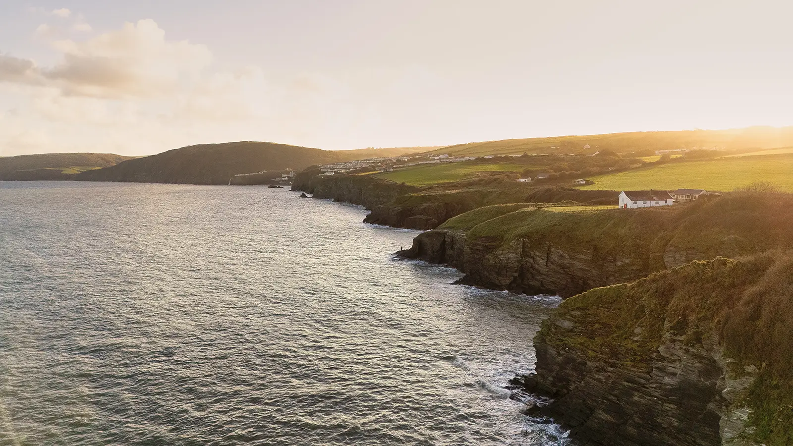 Ceredigion coast, Edge House sits dramatically on a cliffside site overlooking the Irish Sea.